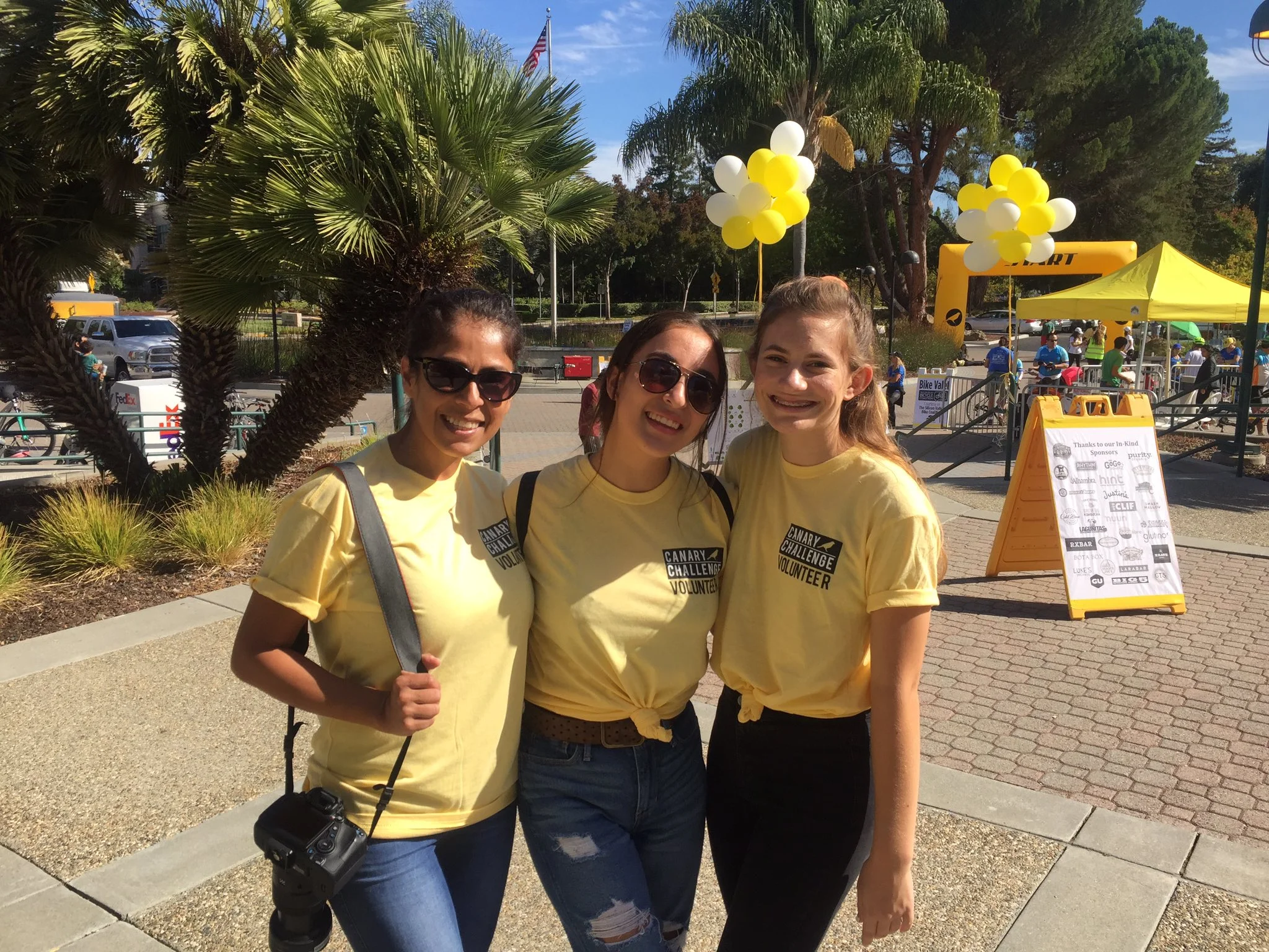 Canary Challenge volunteers in yellow shirts supporting cancer research fundraising